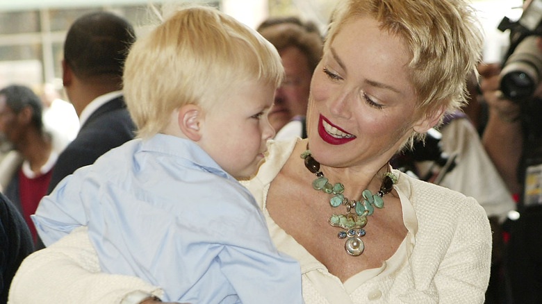 Sharon Stone cuddling her son