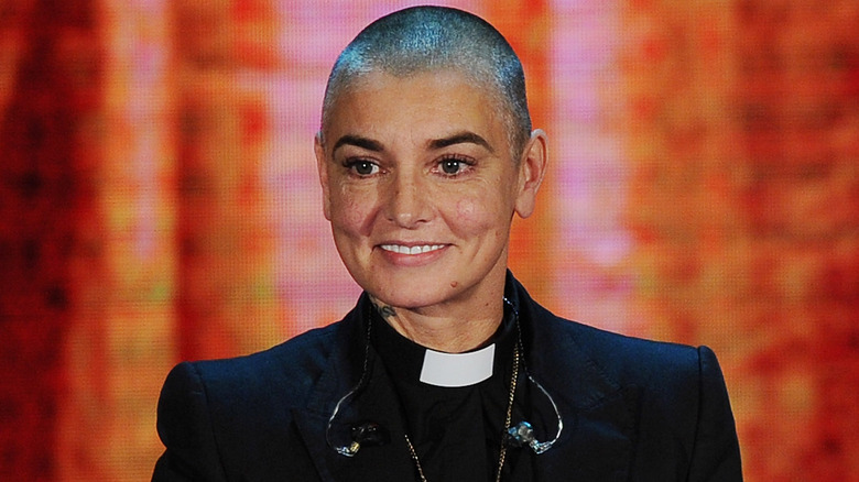 Sinéad O'Connor in a priest's outfit