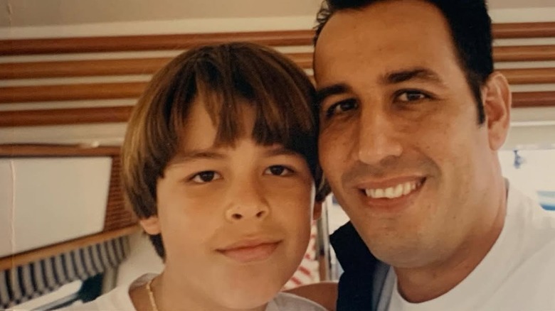 Young Manolo Gonzalez Vergara poses with his father