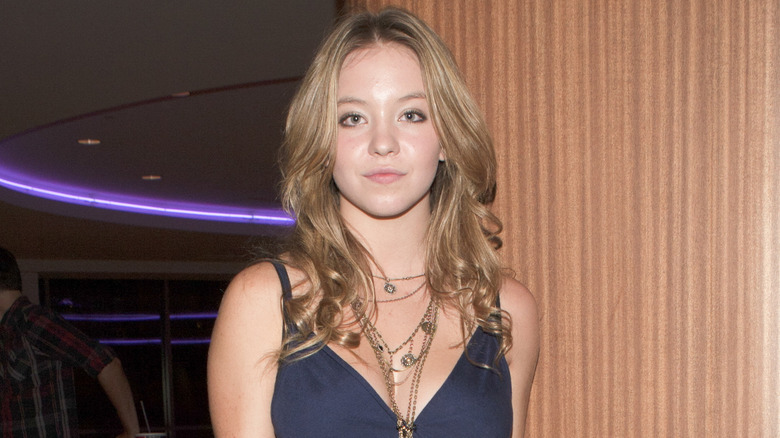 Sydney Sweeney wearing layered necklaces