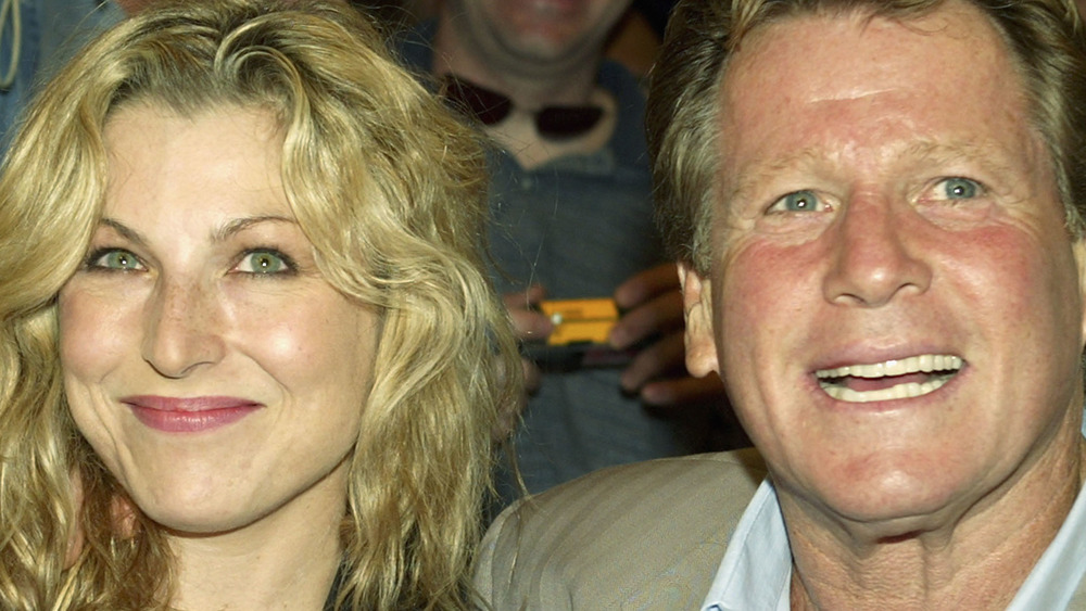 Tatum O'Neal and Ryan O'Neal smiling