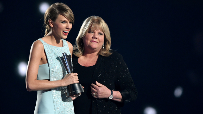 Taylor Swift standing with her mom