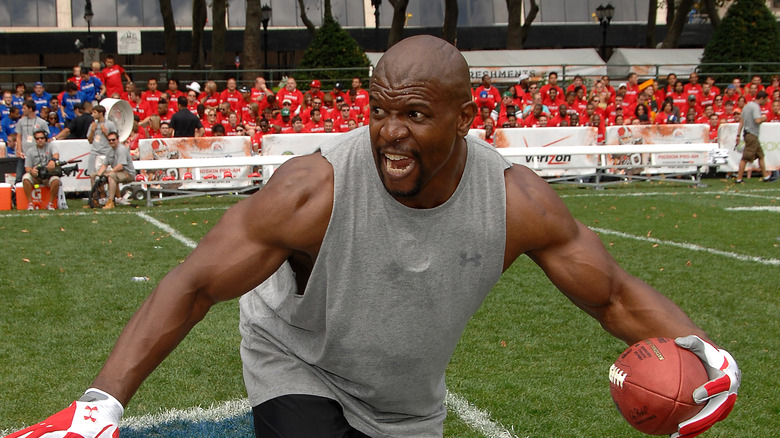 Terry Crews with with football