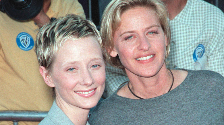 Ellen DeGeneres smiling with Anne Heche