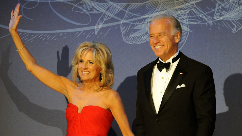 Joe and Jill Biden smiling at a crowd