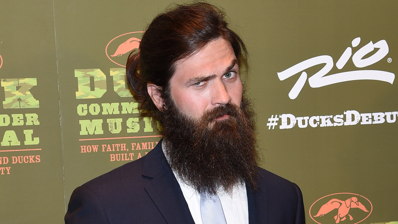 Jep Robertson wearing suit on red carpet