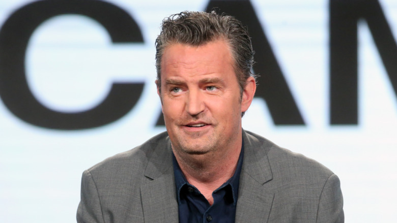 Matthew Perry speaking on stage