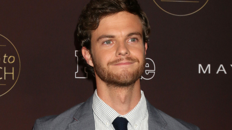 Jack Quaid smiling 