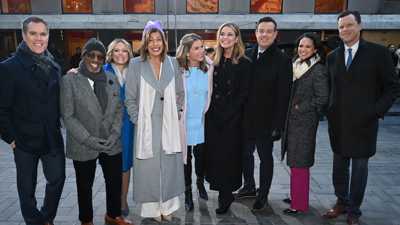 The Today show cast standing together and smiling