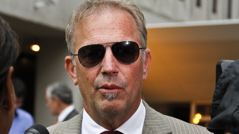 Kevin Costner wearing sunglasses