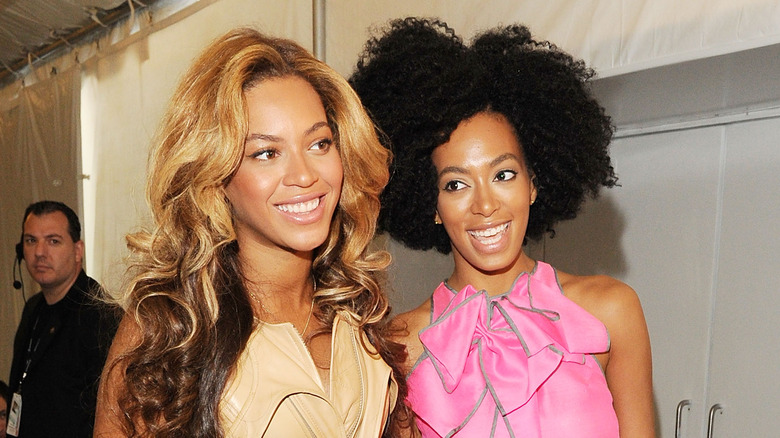 Beyonce and Solange Knowles walking