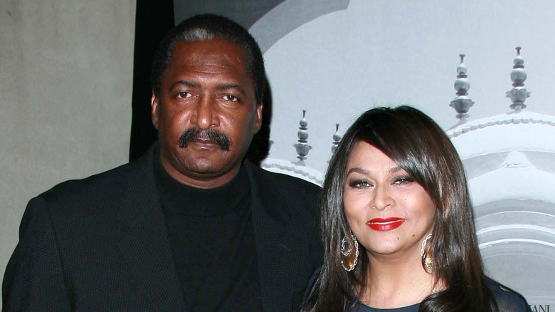 Mathew Knowles and Tina Knowles posing