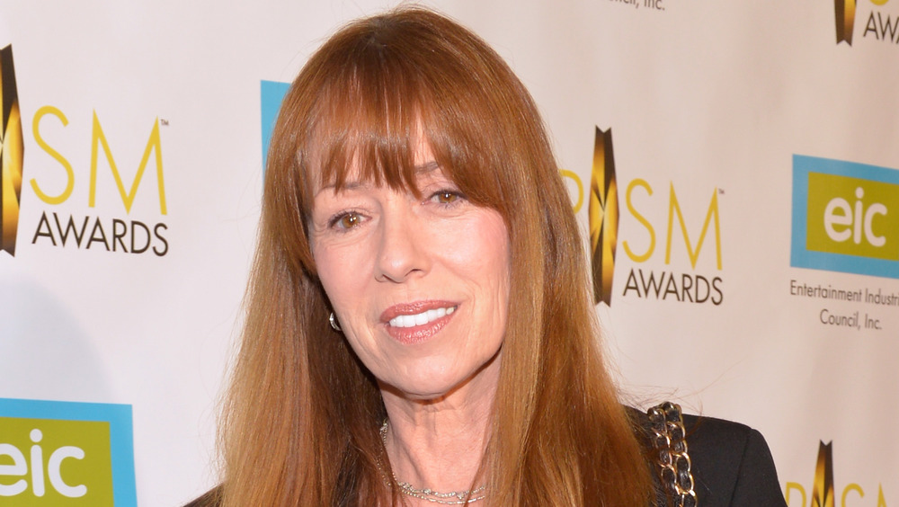 Mackenzie Phillips grimacing