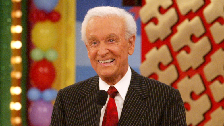 Bob Barker in a stripped suit and red tie