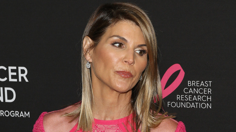 Lori Loughlin in a hot pink dress