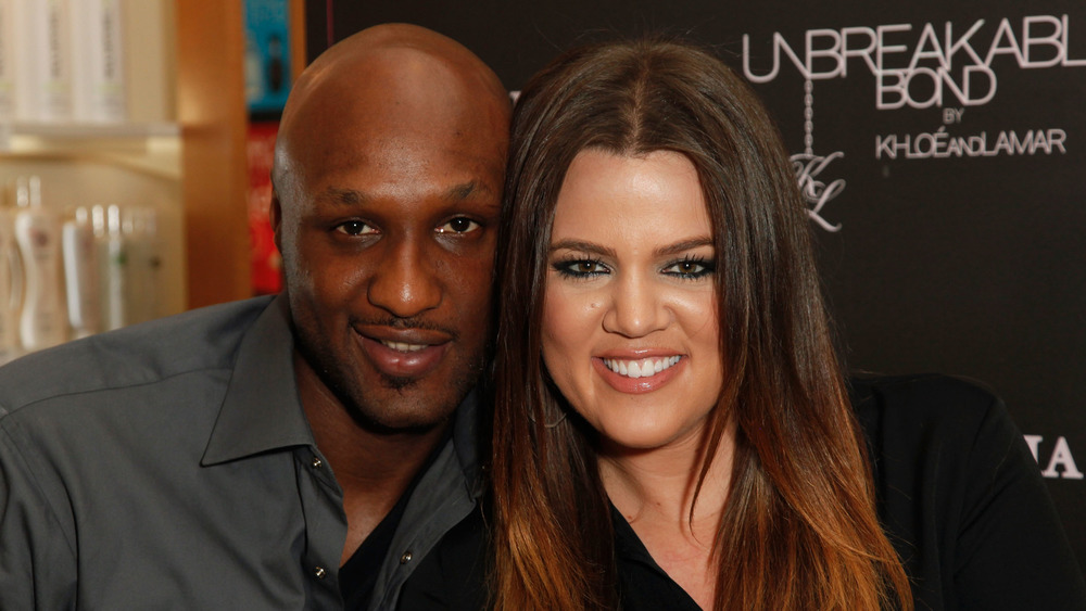 Lamar Odom and Khloe Kardashian at an event