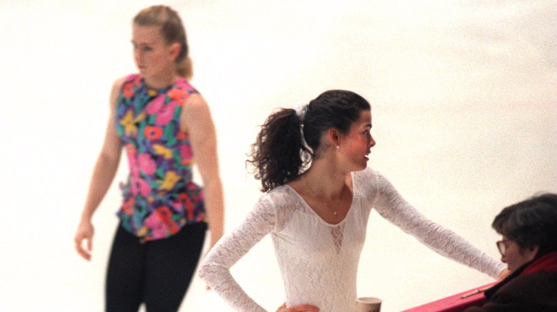 Tonya Harding skating behind Nancy Kerrigan