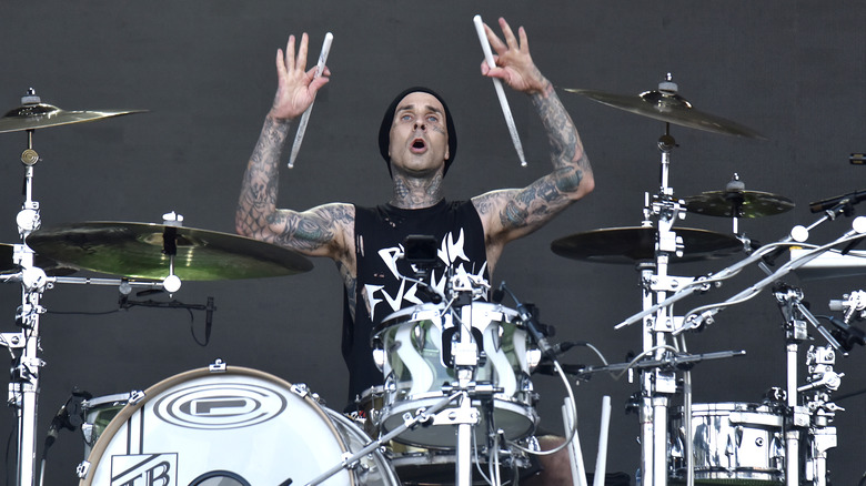 Travis Barker playing drums