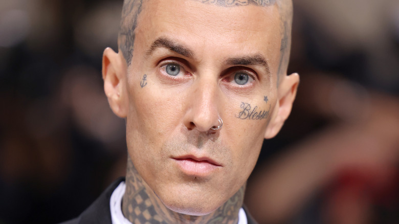 Travis Barker posing at 2022 Met Gala