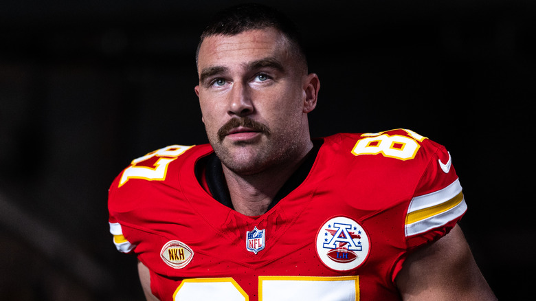 Travis Kelce playing football