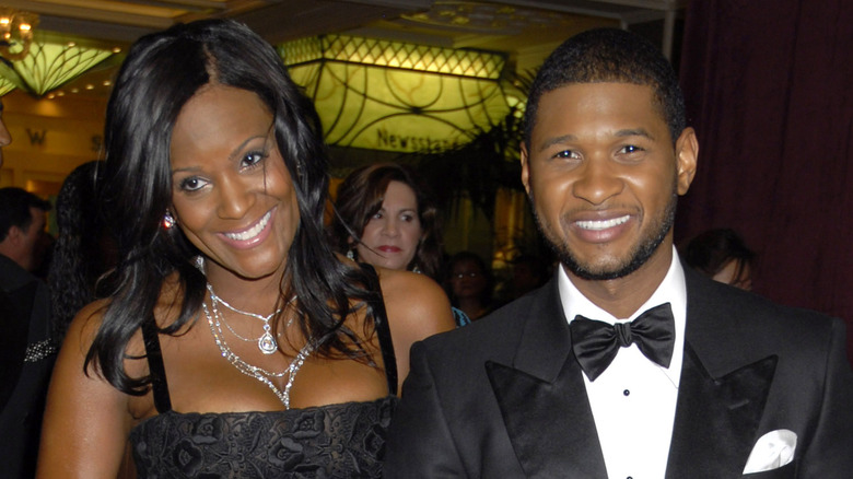 Tameka Foster and Usher pose together