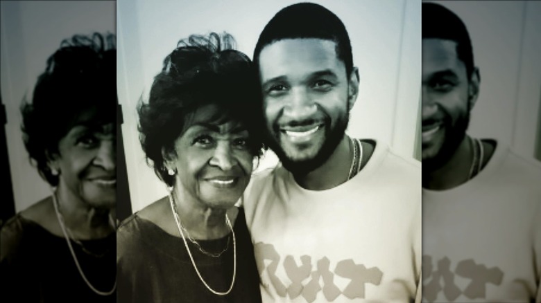 Usher posing with his grandmother Tina