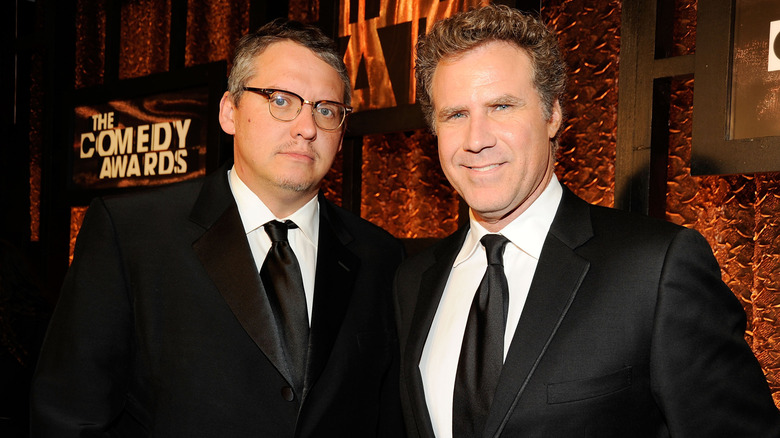 Adam McKay and Will Ferrell posing together on the red carpet at The Comedy Awards in happier times.