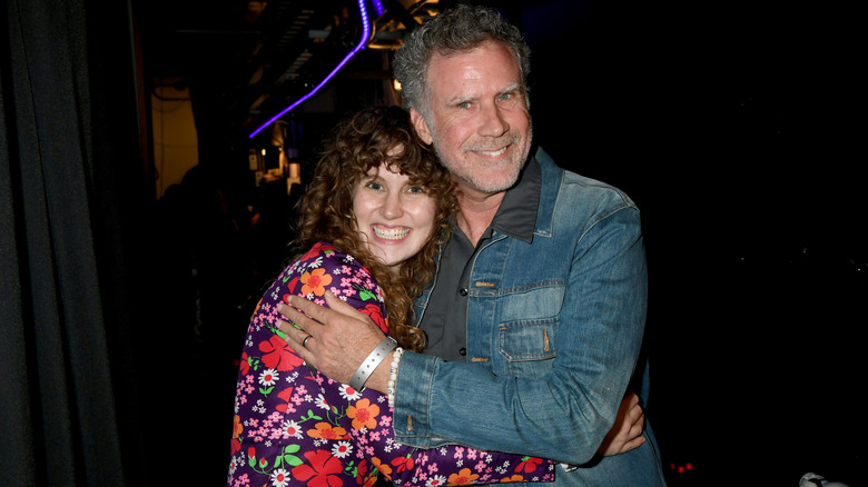 Will Ferrell posing with his longtime assistant Carolina Barlow, who was involved in a car accident with him.