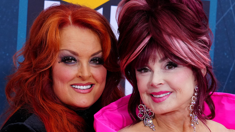 Wynonna Judd and Naomi Judd posing together