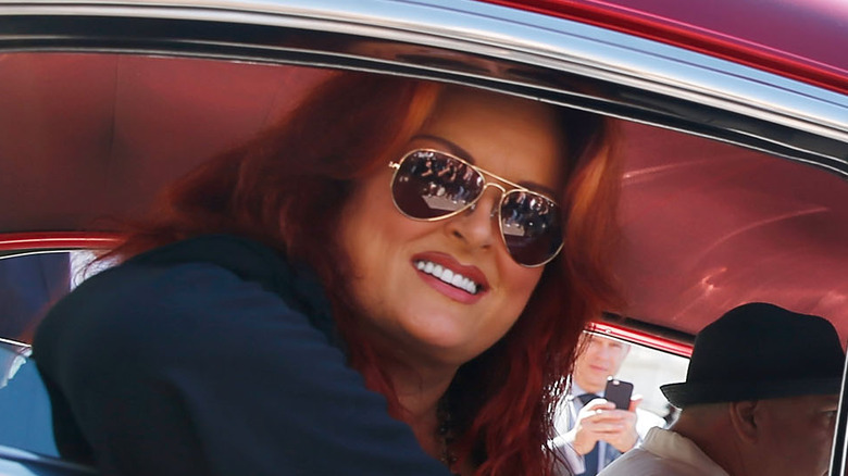 Wynonna Judd wearing sunglasses