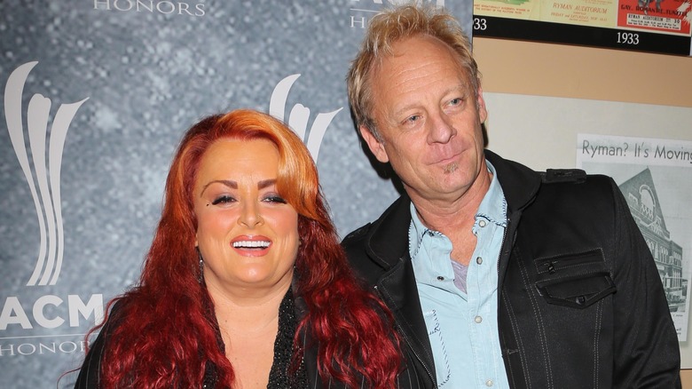 Wynonna Judd and Cactus Moser posing together