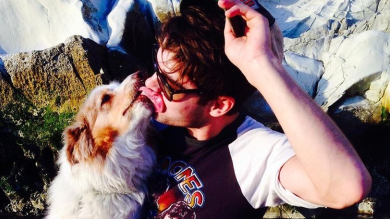 Zac Efron kissing his dog