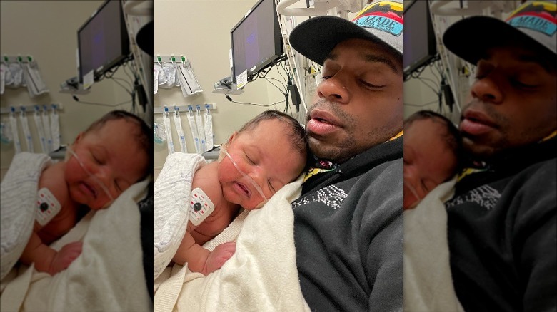 Jimmie Allen with his baby at the hospital.