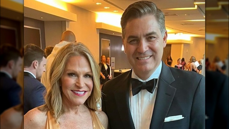 Jim Acosta poses with Alice Stewart.