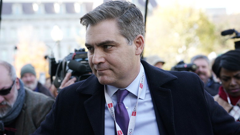 Jim Acosta walking to the White House.