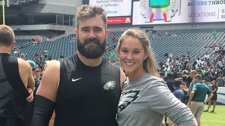 Jason and Kylie Kelce on the field