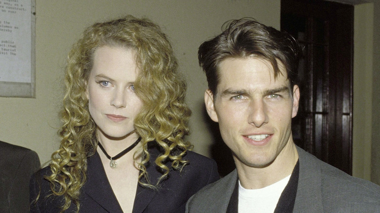 Tom Cruise and Nicole Kidman in a hallway