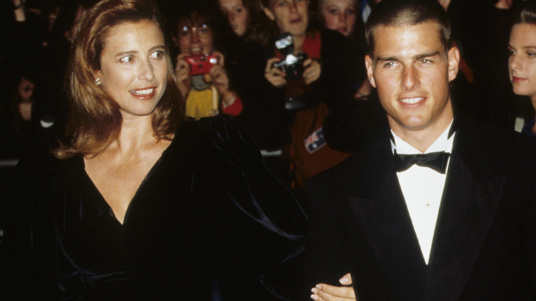 Tom Cruise and Mimi Rogers arriving at an event