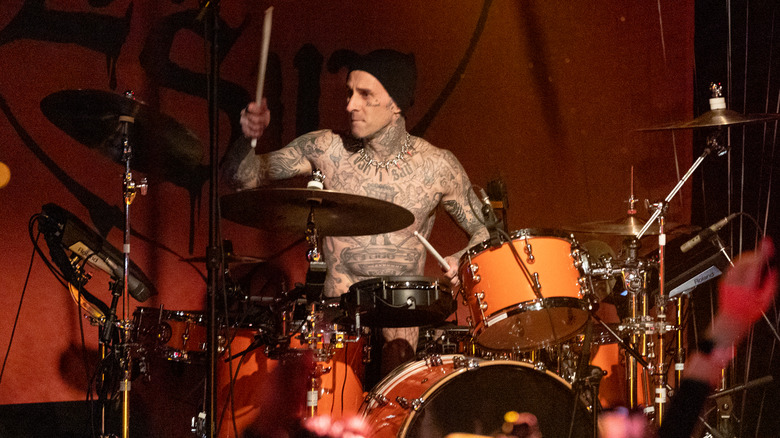 Travis Barker drumming on stage