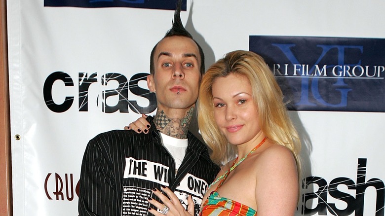 Shanna Moakler posing with Travis Barker