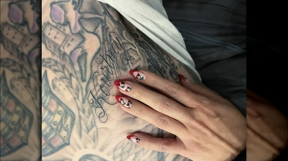 Travis Barker's 'Kourtney' tattoo