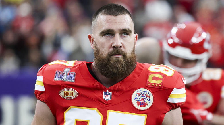 Travis Kelce looking serious on football field