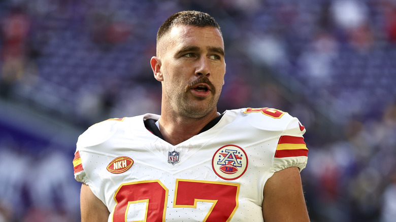 Travis Kelce playing football