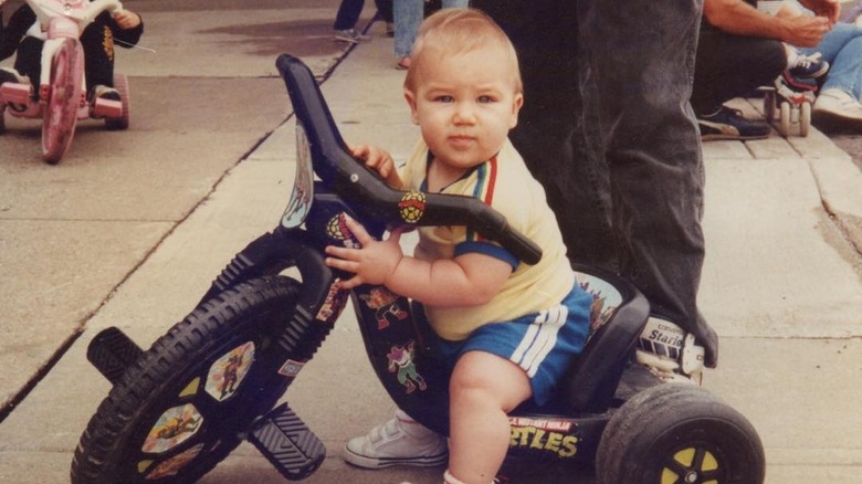 Travis Kelce on tricycle