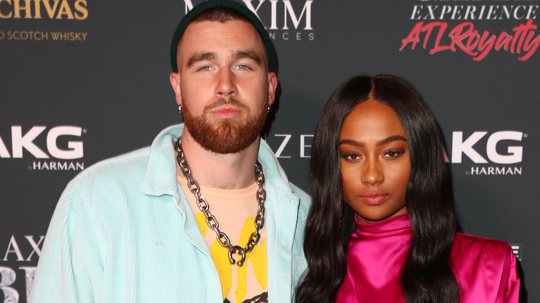 Travis Kelce and Kayla Nicole posing