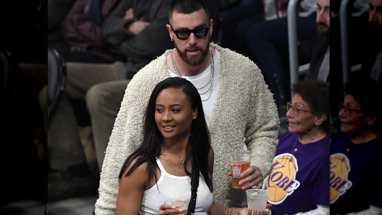 Kayla Nicole and Travis Kelce courtside