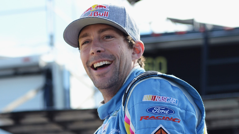 Travis Pastrana with a car