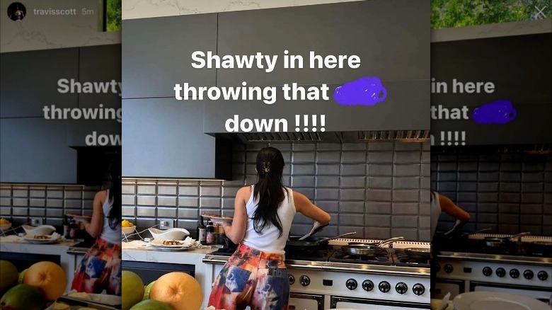 Kylie Jenner serving food with the caption "Shawty in here throwing that *** down !!!!"