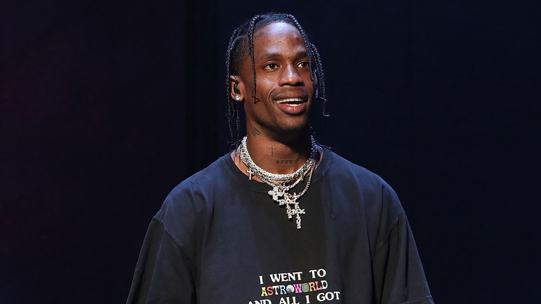 Travis Scott appears on stage 