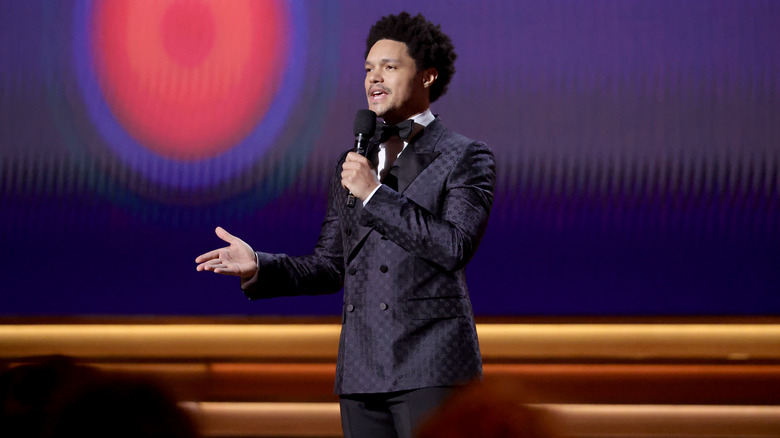 Host Trevor Noah speaking onstage during the 64th Annual GRAMMY Awards